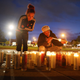 Mourners light candles at a makeshift memorial outside of Tops market on May 16, 2022, in Buffalo, New York.